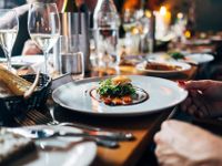 event with set tables and plated meal