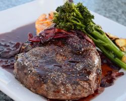 ribeye steak dinner with broccoli and potatoes